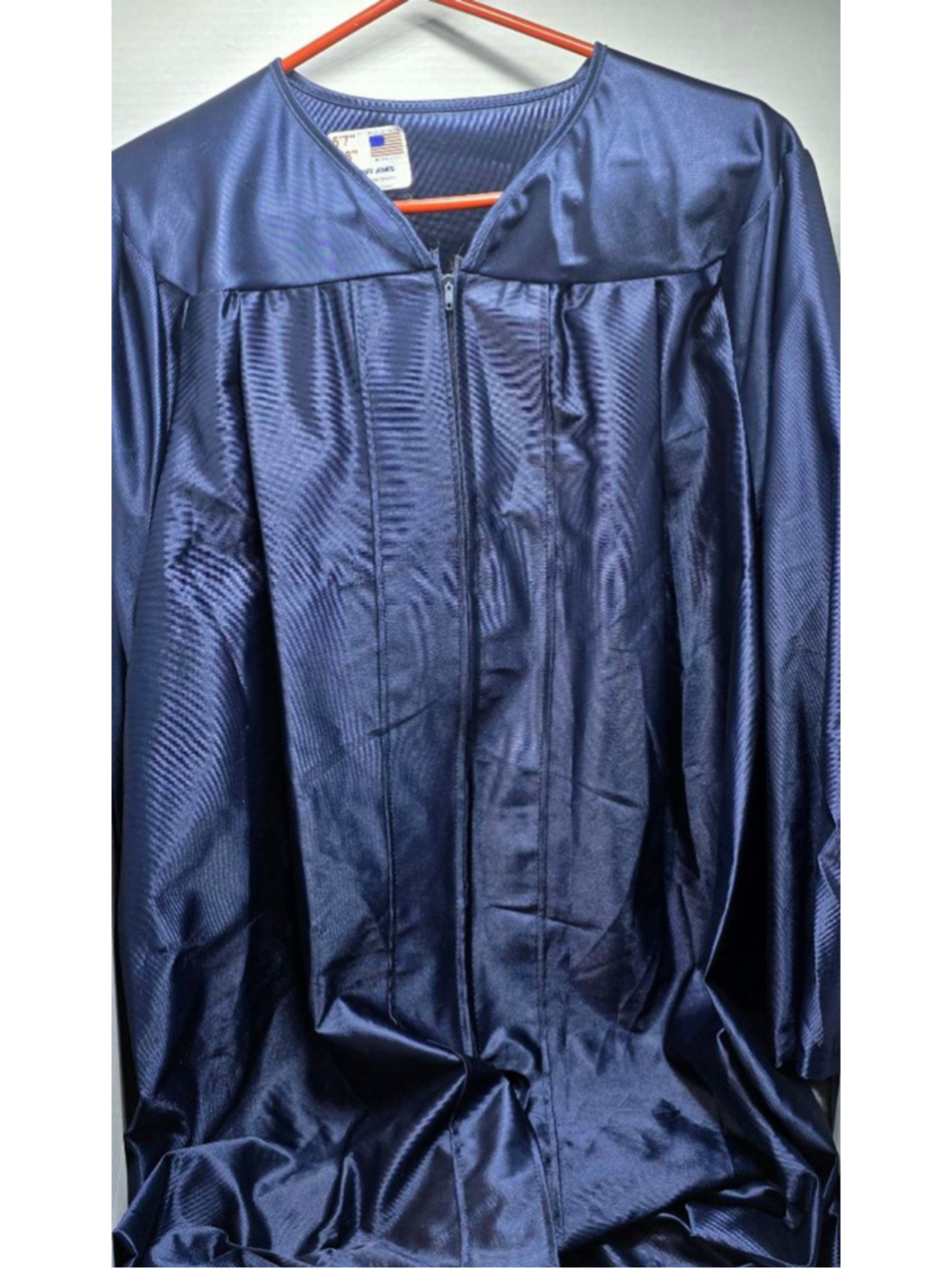 royal blue Jostens graduation gown designed to fit individuals between 5'07" and